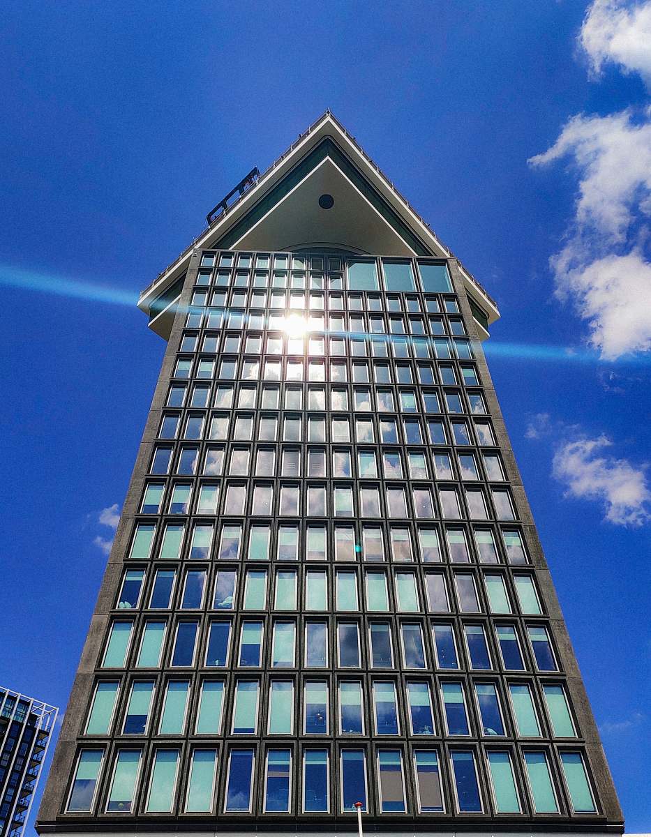 office building blue glass high-rise building high rise